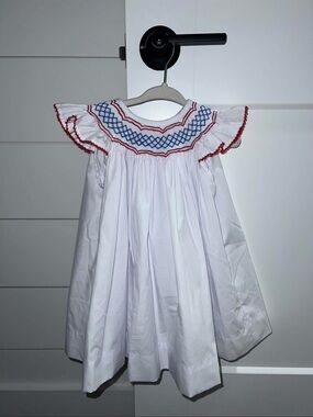 The Beaufort Bonnet Company White Dress with Red and Blue Smocking
